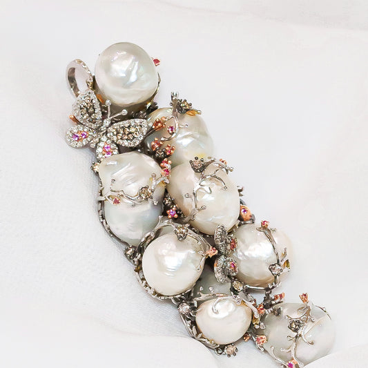 Exotic Baroque Pearl Pendant set in 18K gold, Diamonds & Sapphires
